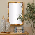 Miroir mural en métal avec détails perlés doré rectangulaire moderne décoratif