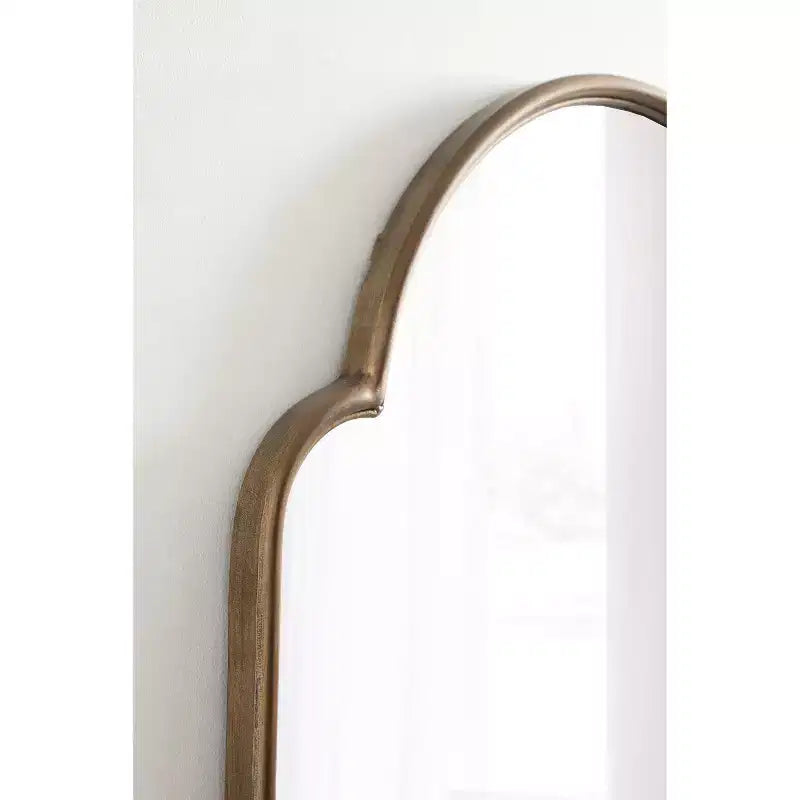Miroir arche en métal doré