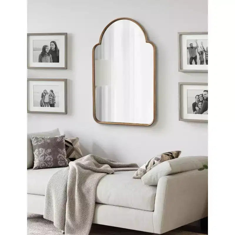 Miroir arche en métal doré